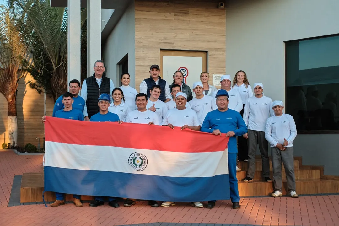 The Paraguay team together outside the facility