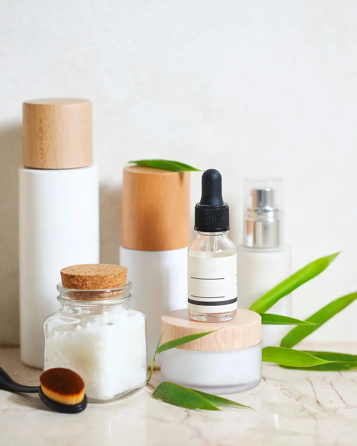 Skincare products arranged with natural ingredients